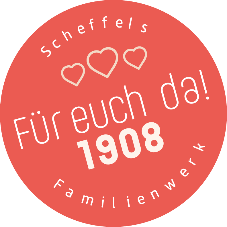 Ein roter Kreis mit der Aufschrift Scheffels Familienwerk – Für euch da! 1908